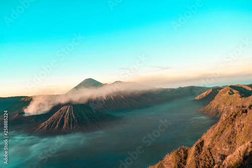 Beautiful colorful sunrise over Mount Bromo and wild island in Mount Bromo National Park