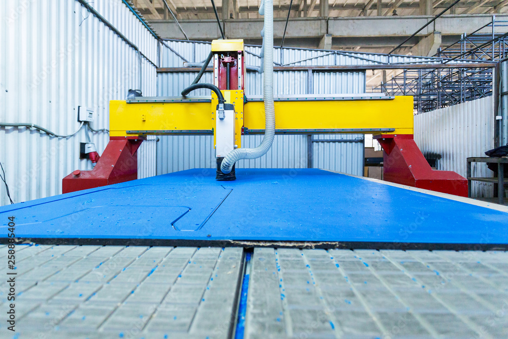 Naklejka premium milling machine cuts plastic in production