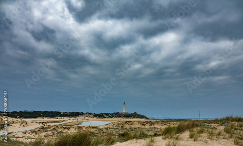 Storm over Trafalgar lighthouse in Cadiz, Spain