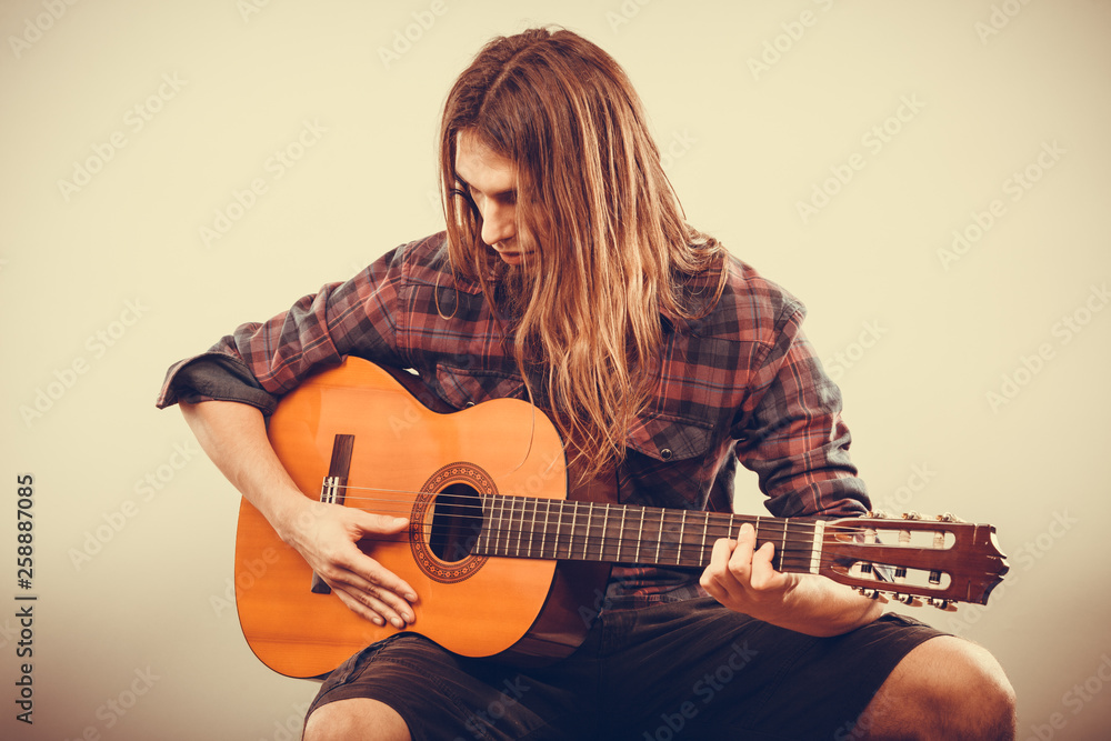 Fototapeta premium Guitarist is playing the guitar.