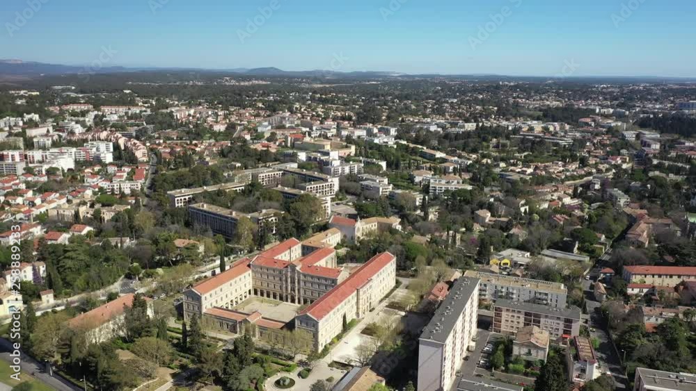 Residential area in Montpellier city center drone shot sunny day, buildings houses and city park Residential area in Montpellier city center drone shot sunny day, buildings houses and city park