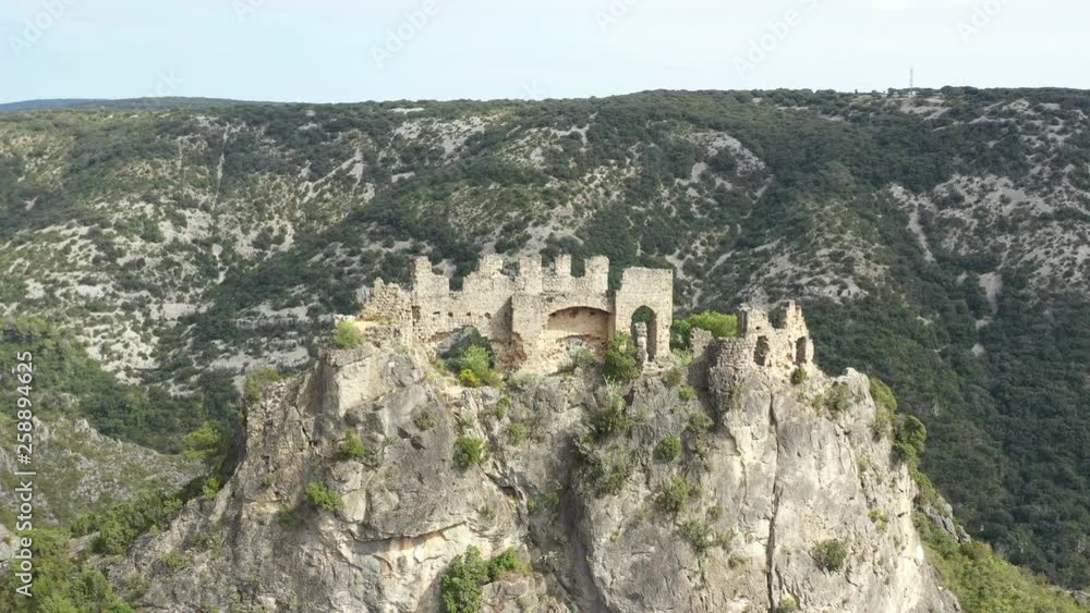 Aerial shot flying over ruins Castle of Verdun or the Giants in Saint Guilhem le Desert France. Aerial shot flying over ruins Castle of Verdun or the Giants in Saint Guilhem le Desert France.