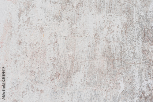 Wall fragment with scratches and cracks