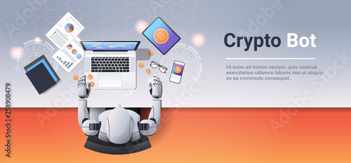 crypto currency trading bot block chain concept bitcoin mining robot sitting workplace using laptop at workplace desk top angle view office stuff flat horizontal