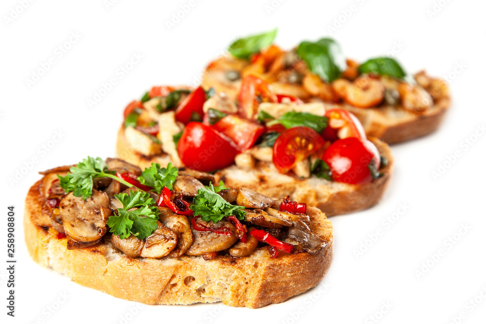 Assortment of traditional Italian bruschettas Assortment of traditional Italian bruschettas