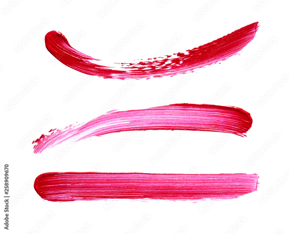 Red lipstick or acrylic paint isolated on white Red lipstick or acrylic paint isolated on white