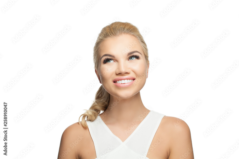 Perfect young woman isolated on white background. Pretty girl looking up and smiling Perfect young woman isolated on white background. Pretty girl looking up and smiling