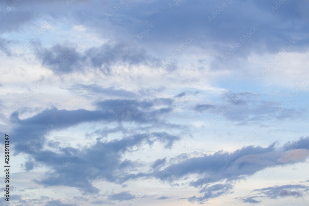 Beautiful sunset sky and a group of clouds close up. Beautiful sunset sky and a group of clouds close up.
