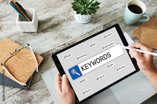 Keywords. SEO, Search engine optimization and internet marketing concept on screen. photo