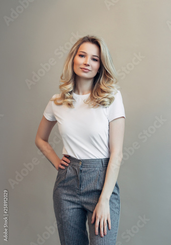 portrait of a young beautiful girl in a white t-shirt 