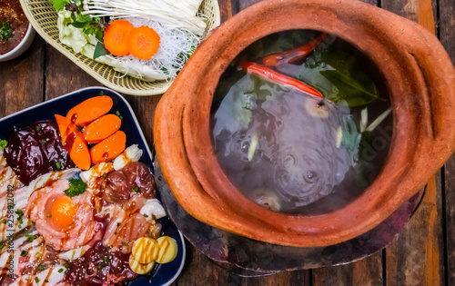 Delicious Shabu hot pot meat, pork seafood and vegetable on table.Top view