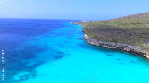 Drone fly over beautiful blue water in beach of Curaçao