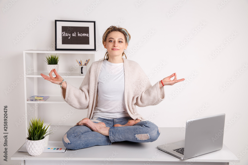 Yoga lifestyle. Woman doing asana isolated on the green mat Yoga lifestyle. Woman doing asana isolated on the green mat