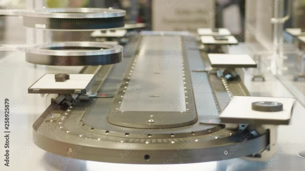 Automatic test set scanning details on high speed laboratory conveyor ...