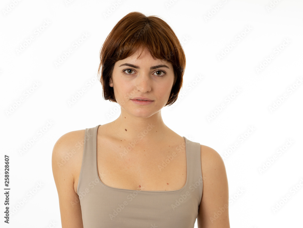 Portrait of sad and serious woman. Isolated in white background. Human expressions and emotions Portrait of sad and serious woman. Isolated in white background. Human expressions and emotions