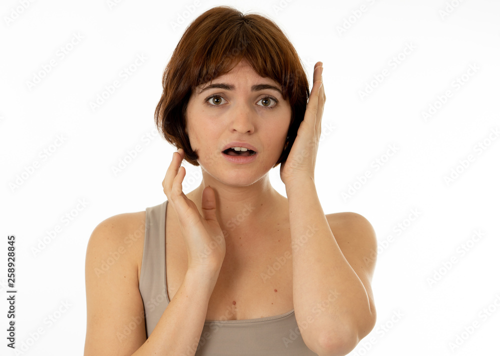 Happy young attractive woman shocked with a surprised funny face. Human expressions and emotions. Happy young attractive woman shocked with a surprised funny face. Human expressions and emotions.