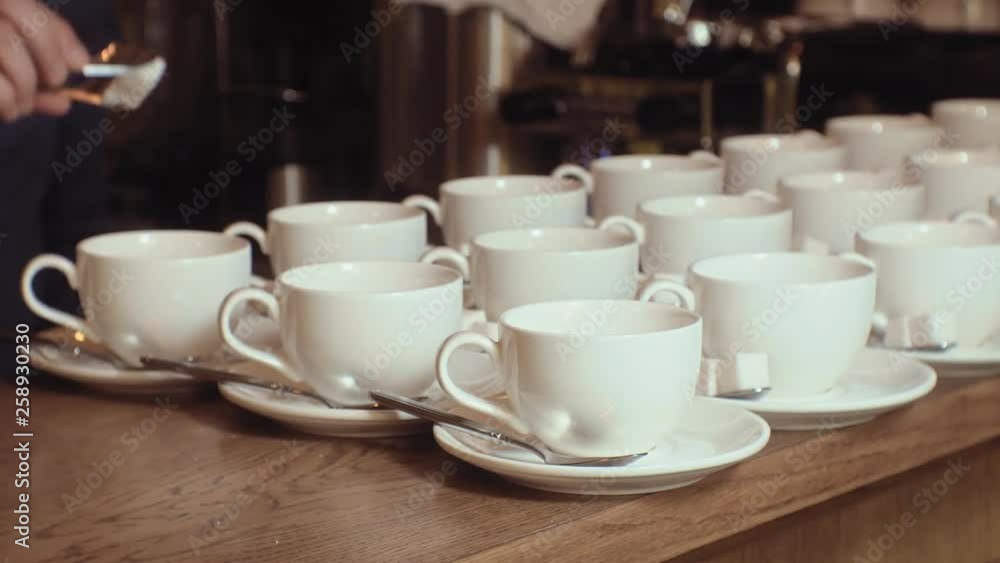 many empty white clean tea cups many empty white clean tea cups