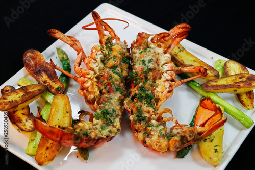 canadian lobster thermidor with asparagus and potato photo