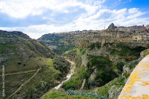 View of the Gravina river's canyon in the Sassi of Matera, the underground city, the ancient town, Basilicata, southern Italy.