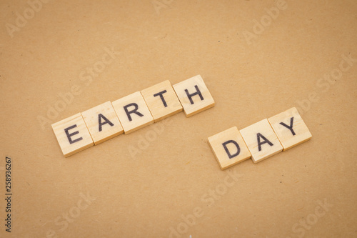 wood word Earth Day using as background Universal day concept and Earth Day concept with copy space for your text or design.