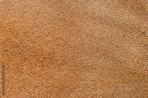 Texture of suede as background. Beige color