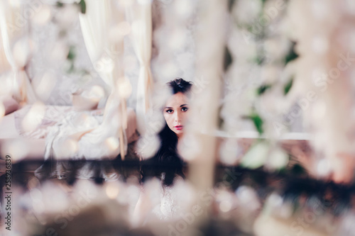 artistic portrait of the bride on the wedding day