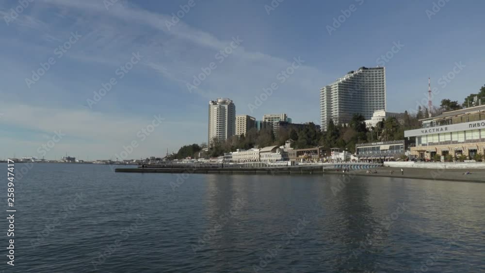 Russian city Sochi and sea coast, Russia, view from sea. Winter time Russian city Sochi and sea coast, Russia, view from sea. Winter time
