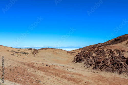 Desert like Landscape above the clouds on the slopes of the Teide Mountain, Tenerife, Canary Islands, Spain