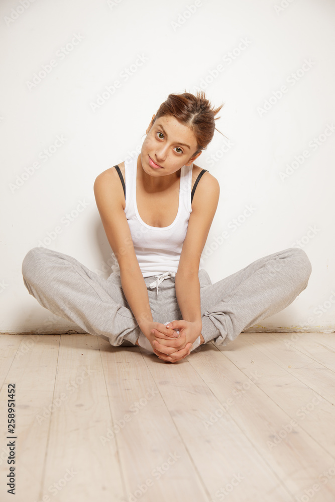 Beautiful and cute brunette girl posing in the studio Beautiful and cute brunette girl posing in the studio