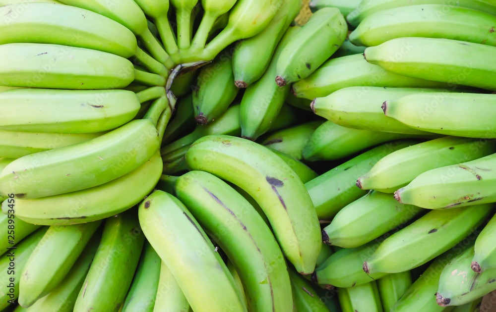 image of green bananas stacked for sale image of green bananas stacked for sale