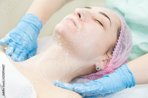 Process cosmetic mask of massage and facials in beauty salon 