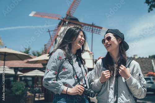 Photography two beautiful asian friends smiling happy travel in copenhagen town denmark