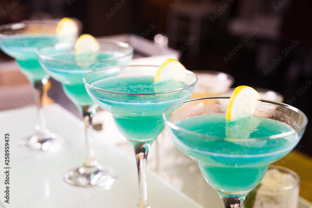 Set of cocktails at the bar, bright colored.
