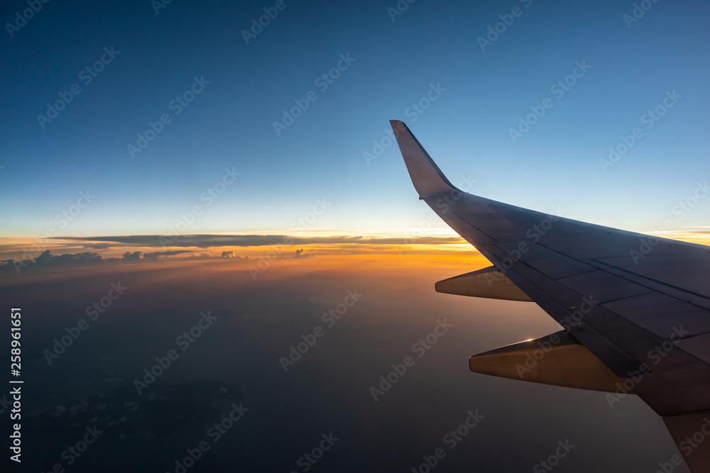 airplane flying above the clouds airplane flying above the clouds