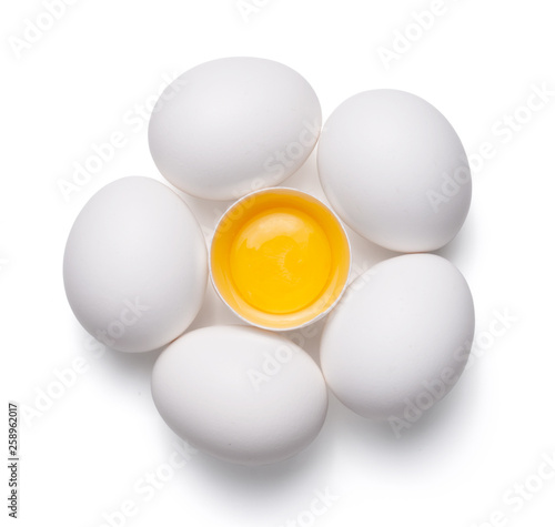 top view of group eggs and one broken egg isolated on white background