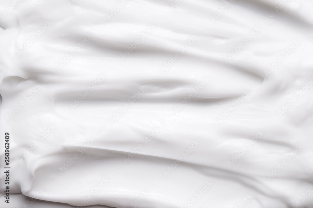 White texture of cosmetic body care cream background