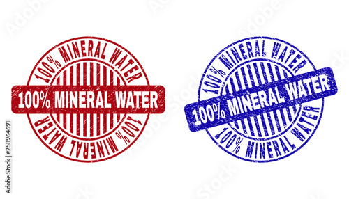 Grunge 100% MINERAL WATER round stamp seals isolated on a white background. Round seals with grunge texture in red and blue colors.