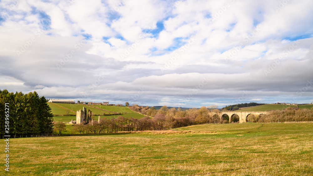 Edlingham Castle and Railway Viaduct, near the hamlet of Edlingham in Northumberland, Northeast England