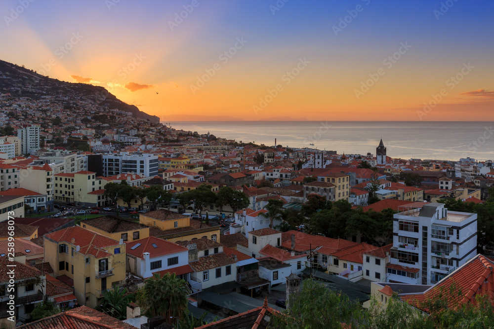 Beautiful skyline cityscape of the city Funchal on the island Madeira at sunrise in summer