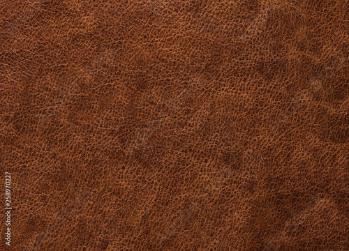 Dark texture of brown leather is coarse