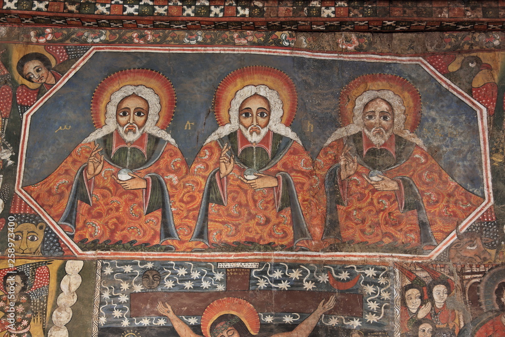 GONDAR, ETHIOPIA - MARCH 3, 2019: religious ceiling and wall paintings in Debre Birhan Selassie church