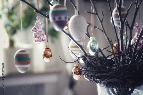 Canvas Print Branches with buds stuck in a nest