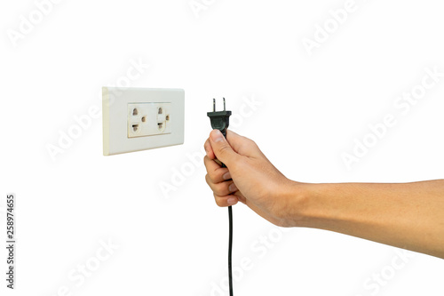 hand holding electric plug isolated from a white background. concept Save energy and reduce global warming. clipping path. illustration