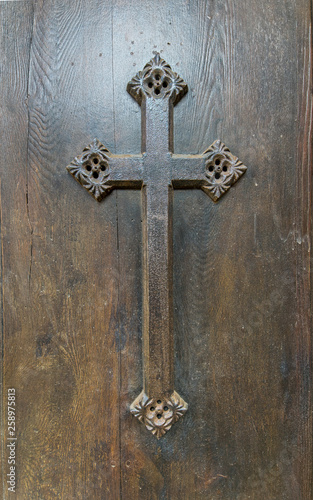Ancient cross carved on wood