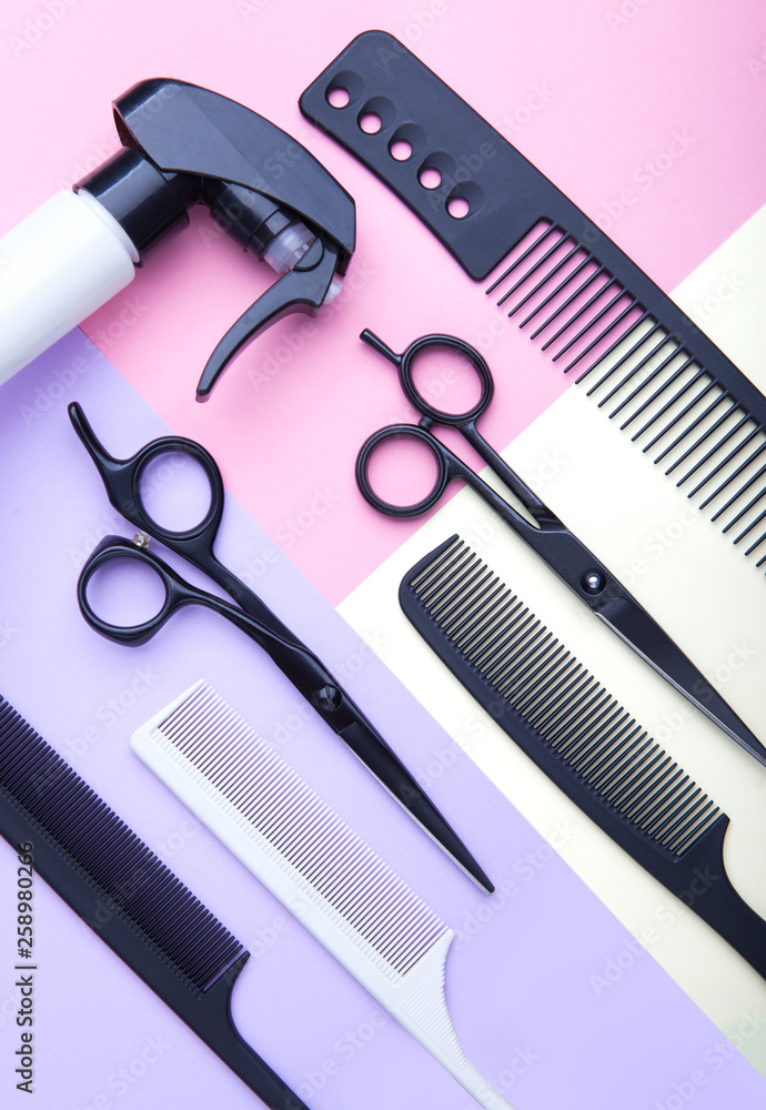 Stylish professional barber scissors and combs, hairdresser salon concept, hairdressing tool set. Haircut accessories