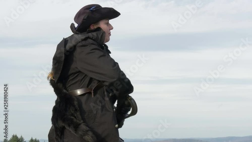 Wallpaper Mural 4K – Female Hunter standing outside Torontodigital.ca