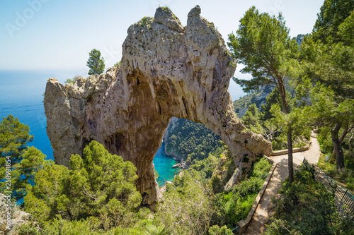 Arco Naturale, natural arch on coast of Capri island, Italy.