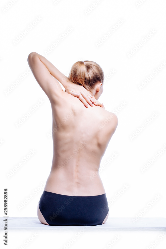 Obraz premium Back of beautiful nude woman on white background
