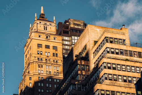 Close-up view of old and modern apartment building in Midtown Manhattan New York City