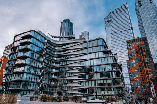 General view of 520 West 28th by Zaha Hadid and Hudson Yards from High Line Park in Chelsea New York City